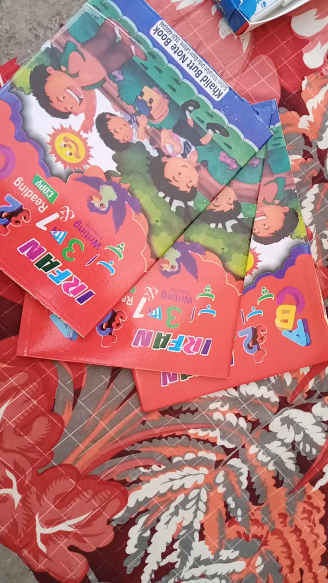 A close-up of early learning books for children.